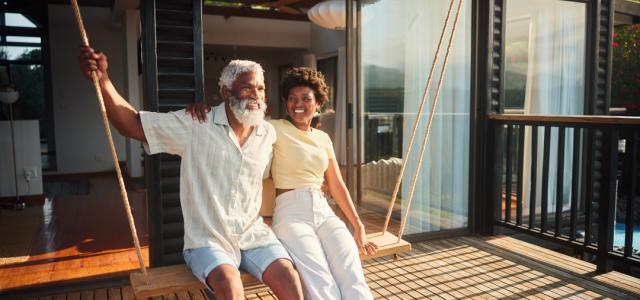 grandpa-granddaughter-on-a-porch-swing